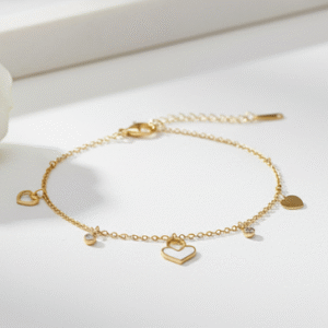 Gold heart charm bracelet with crystal drops on adjustable gold chain for women