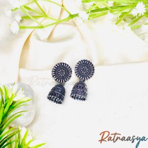 Sunflower stud oxidized jhumki earrings by Ratnaasya with detailed floral design and dome-shaped danglers on a cream background