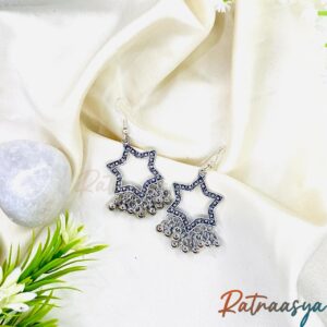 Star design oxidized silver dangler earrings with hanging beads on white background